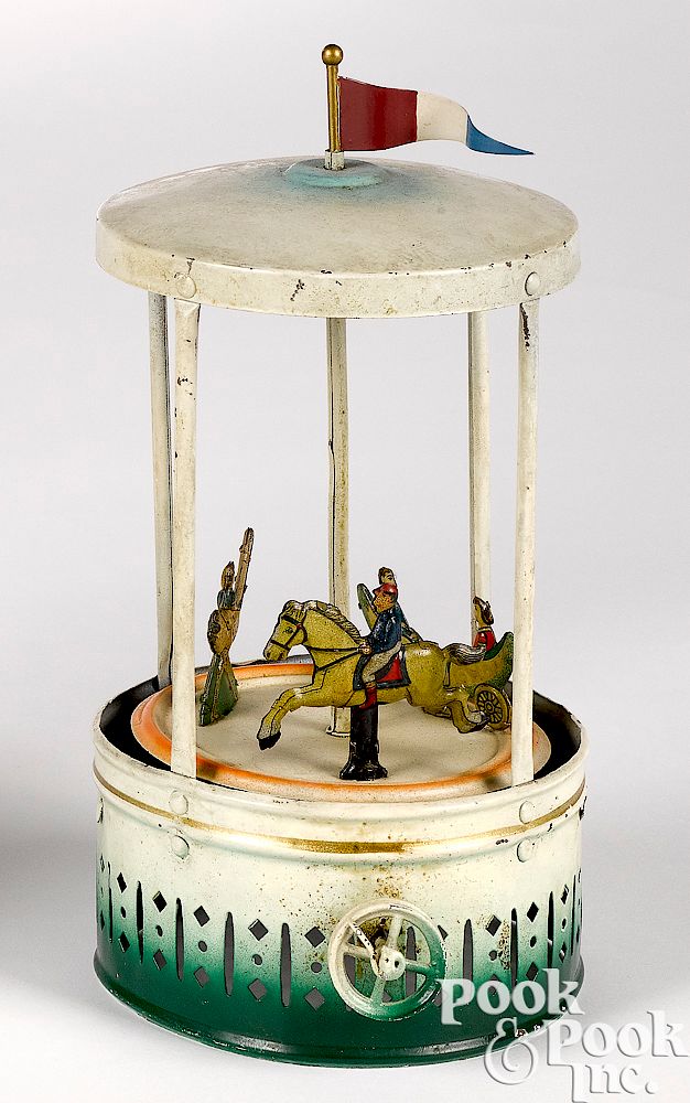 Appraisal: Painted and lithograph tin carousel steam toy Painted and lithograph