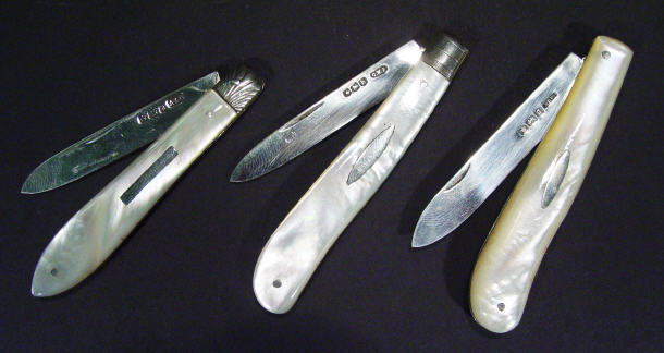 Appraisal: Three mother of pearl handled silver fruit knives Sheffield