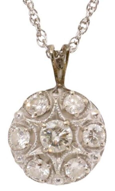 Appraisal: Estate kt white gold round pendant set with seven diamonds