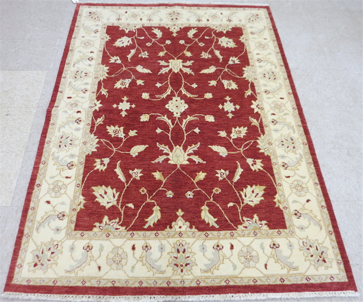 Appraisal: HAND KNOTTED ORIENTAL AREA RUG Pakistani Persian overall khaki floral