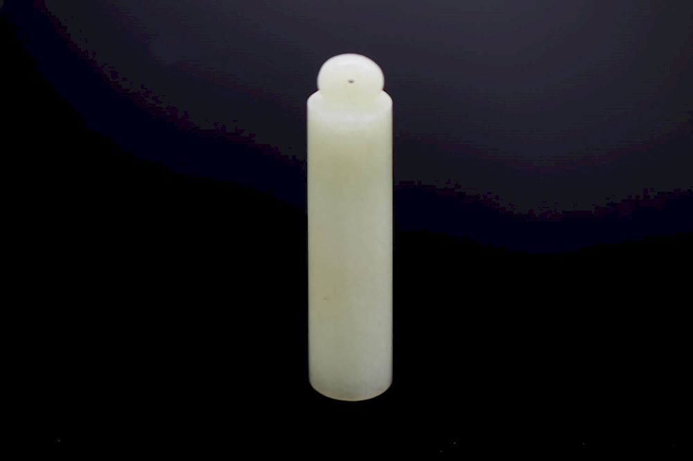 Appraisal: WHITE JADE HAT FINIAL Of tubular form the stone of