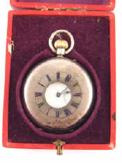 Appraisal: A silver half hunter pocket watch with subsidiary seconds dial