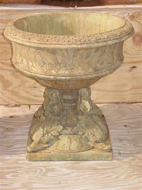 Appraisal: ROCOCCO CAST STONE URN Of circular shape raised atop four