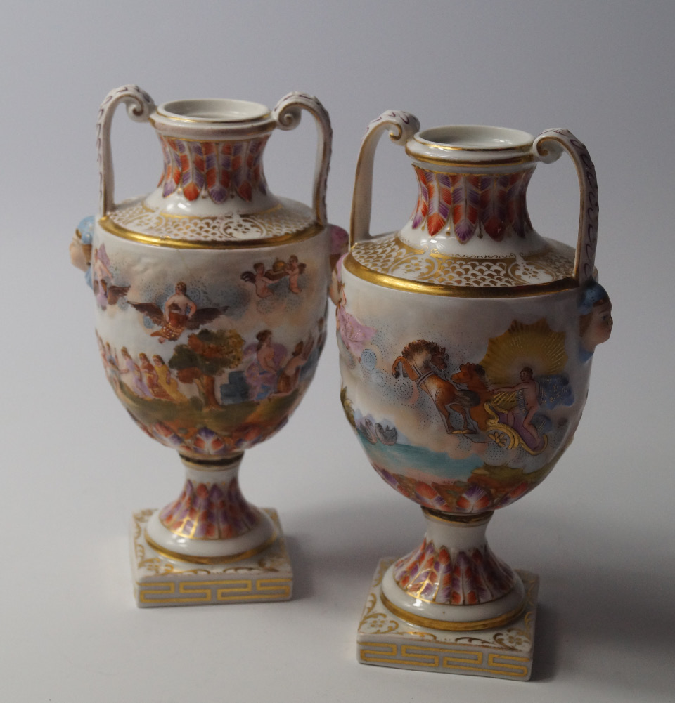 Appraisal: A pair of late thC Crown Naples porcelain twin handled