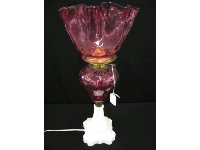 Appraisal: Victorian Cranberry Art Glass Banquet Lamp with matching shade milk