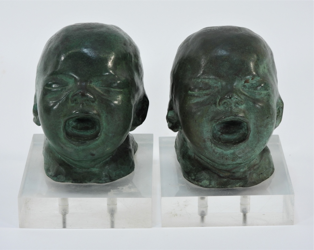 Appraisal: PR BRONZE BABY HEAD BOOKENDS United States th CenturyPair of