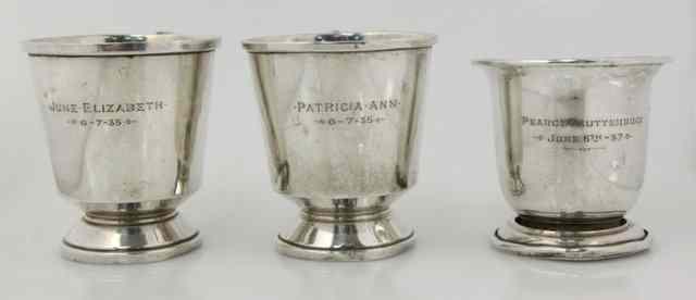 Appraisal: Three silver christening mugs various dates and makers total weight