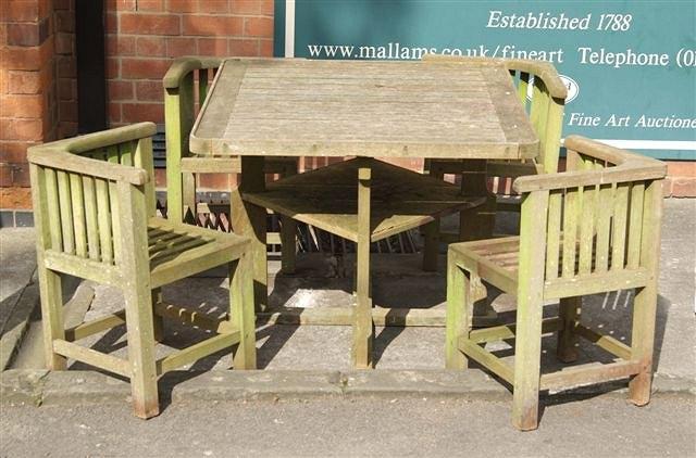 Appraisal: A HEALS SQUARE GARDEN TABLE and four matching chairs square