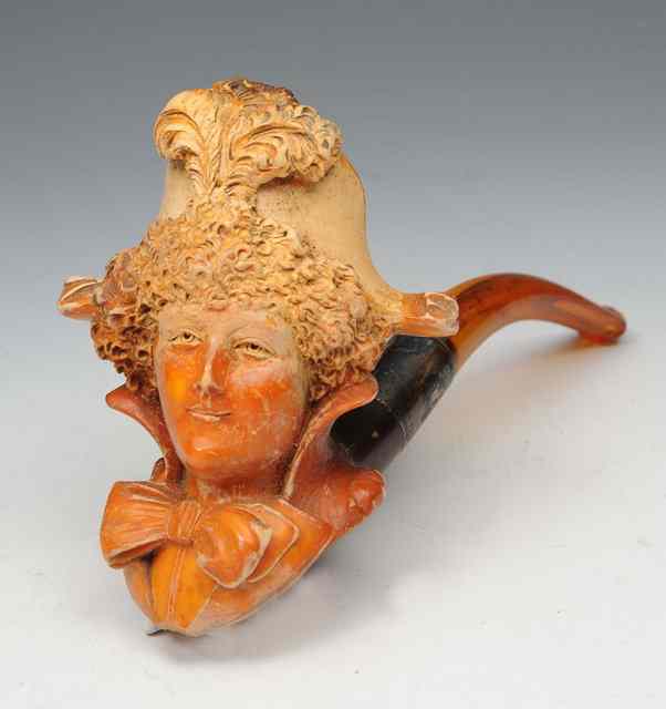 Appraisal: A MEERSCHAUM PIPE in the form of the head and