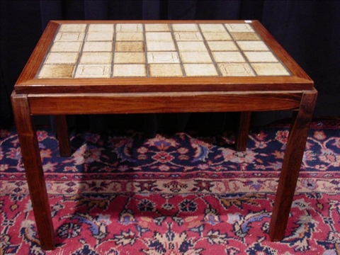 Appraisal: CONTEMPORARY TILE TOP COFFEE TABLE th c Rectangular with brown