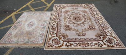 Appraisal: Large rugs with floral designs m x m x m