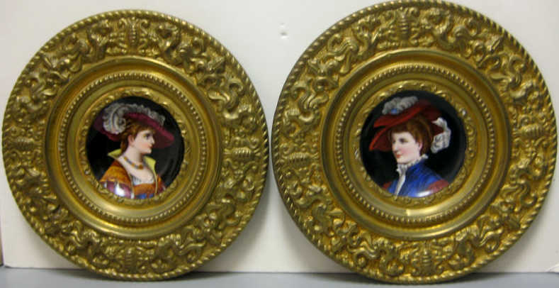 Appraisal: PAIR OF FEMALE PORTRAITS PAINTED ON PORCELAIN Each of a