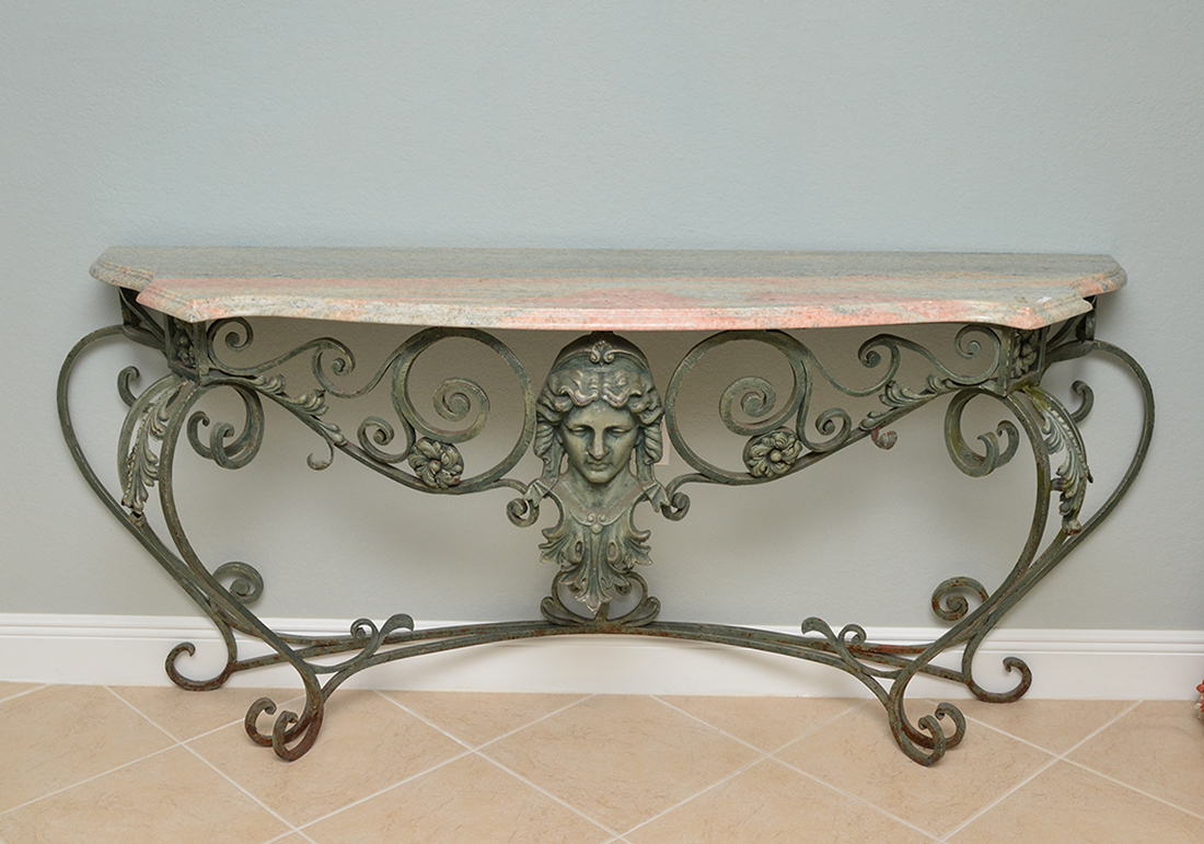 Appraisal: WROUGHT IRON MARBLE TOP FOYER TABLE Patinated wrought iron base