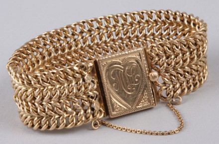 Appraisal: K rosey yellow gold mm wide engraved clasp with safety