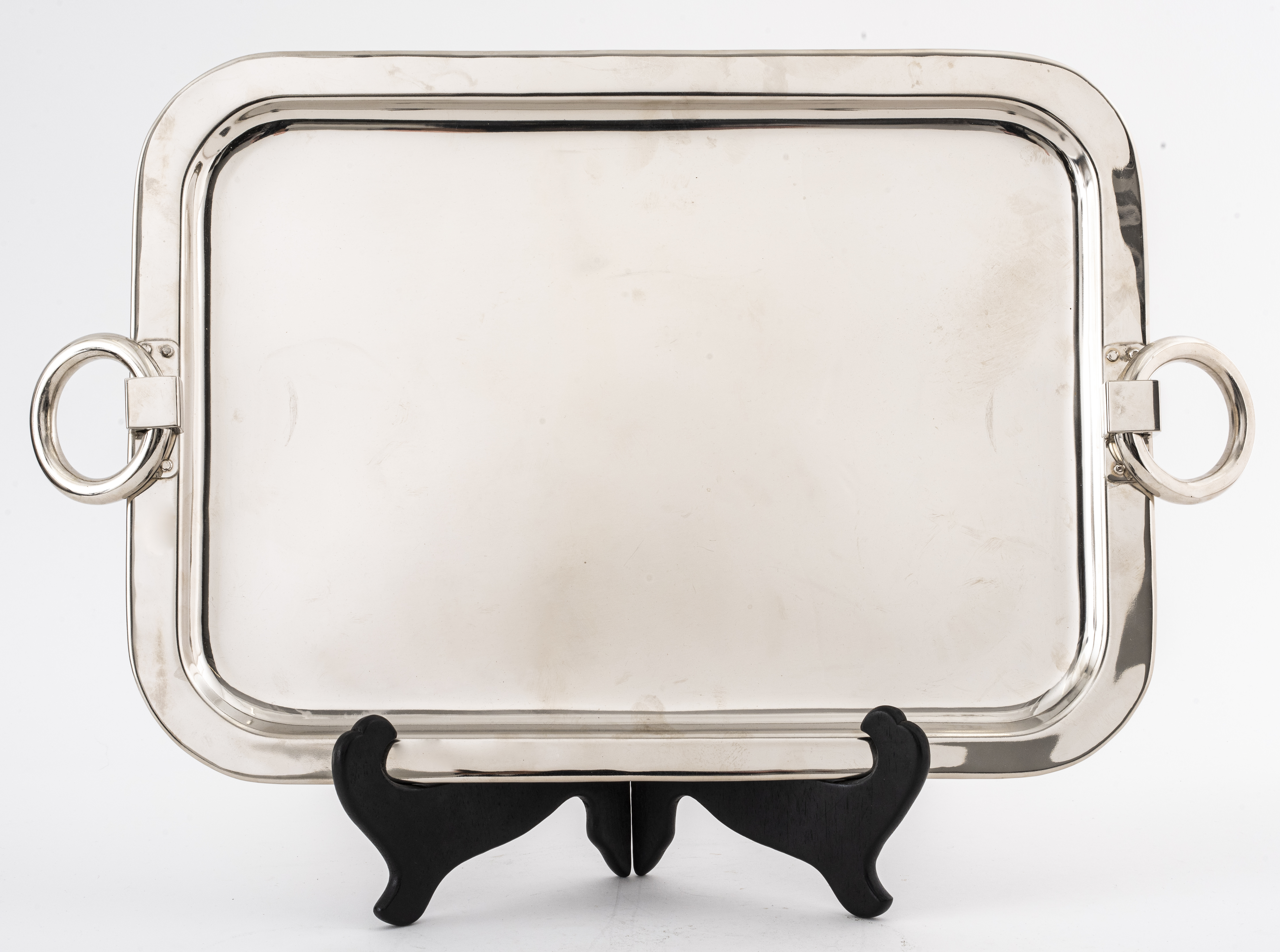 Appraisal: MODERN SILVER-PLATE TRAY Modern silver-plate tray with ring handles H