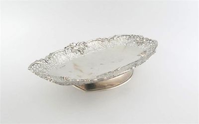 Appraisal: A modern oval dish on spreading base moulded and pierced