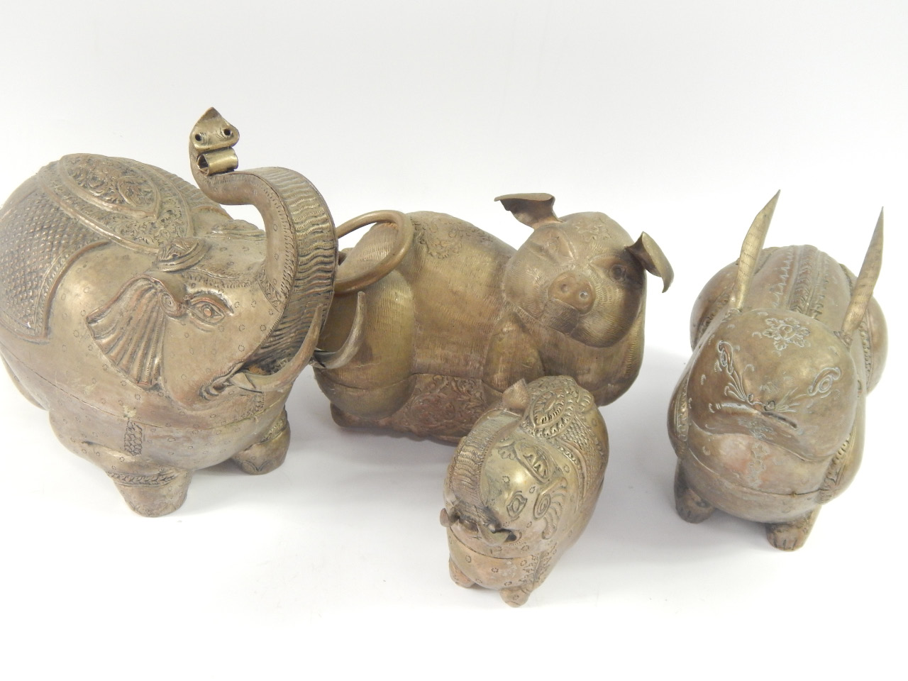 Appraisal: Four cast metal Far Eastern containers two cast as elephants