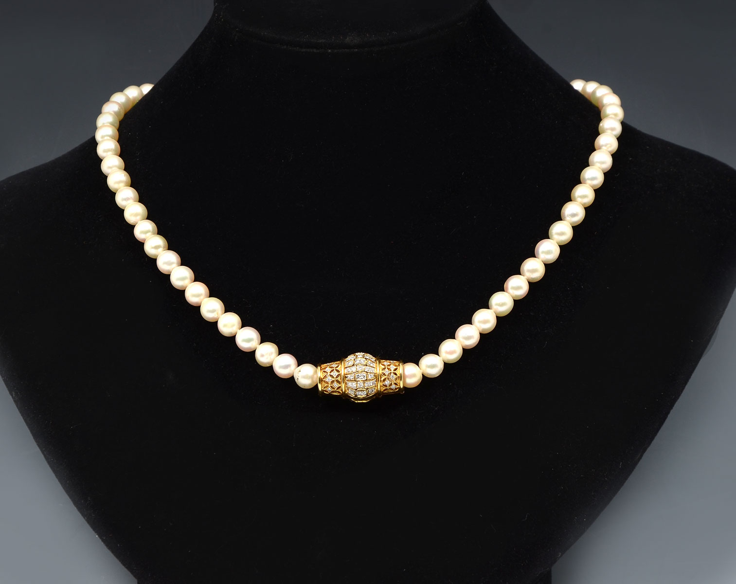 Appraisal: K DIAMOND PEARL ENHANCER AND PEARL NECKLACE Strand of mm