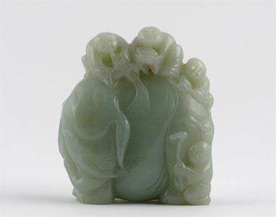 Appraisal: A Chinese jade carving of an elephant with three boys