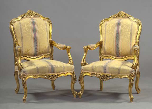 Appraisal: Pair of Louis XIV-Style Giltwood Fauteuils each with a shaped