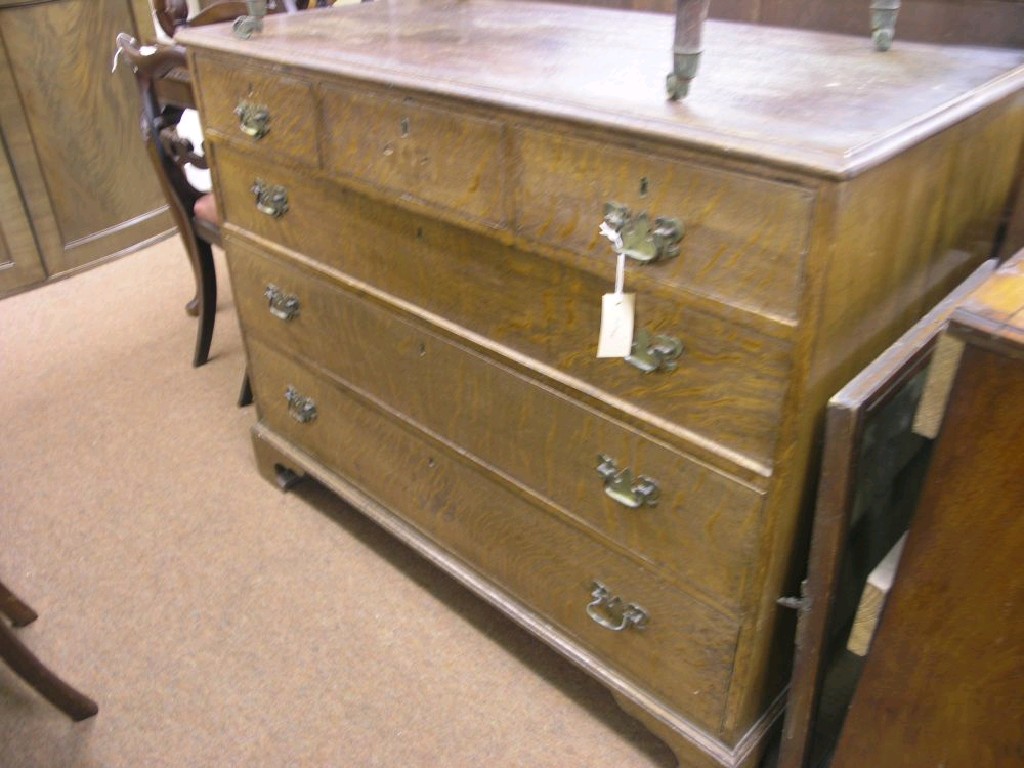 Appraisal: A George III oak chest of drawers three short drawers