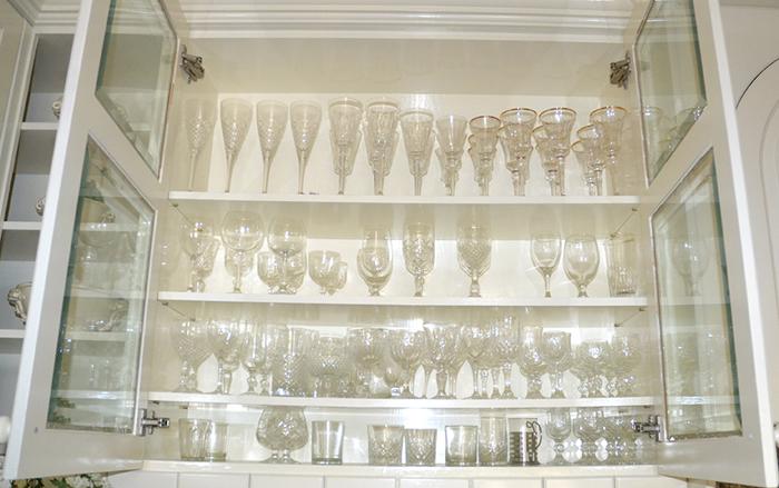 Appraisal: FOUR SHELVES OF CRYSTAL STEMWARE INCLUDES CHAMPAGNE WINES AND TUMBLERS