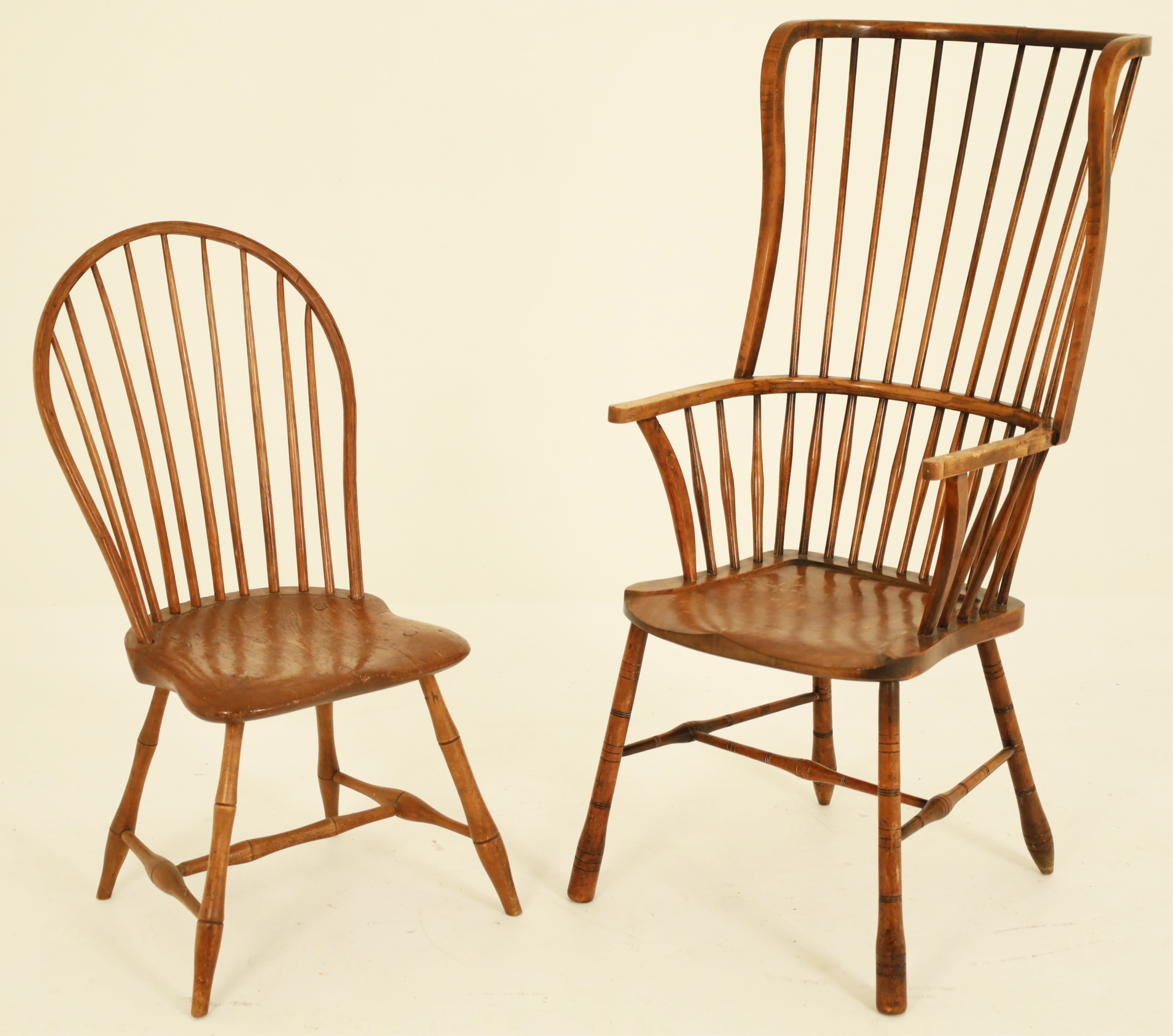 Appraisal: TWO TH C WINDSOR CHAIRS Two miscellaneous Windsor chairs consisting