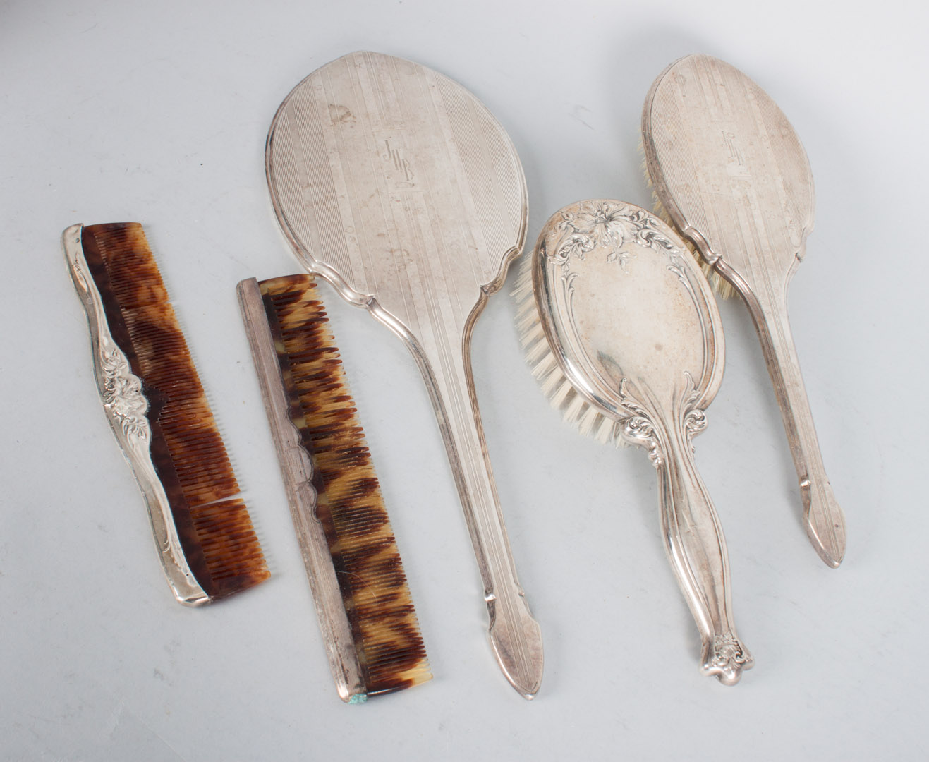 Appraisal: Two sterling silver mounted partial dresser sets comprising unidentified Art