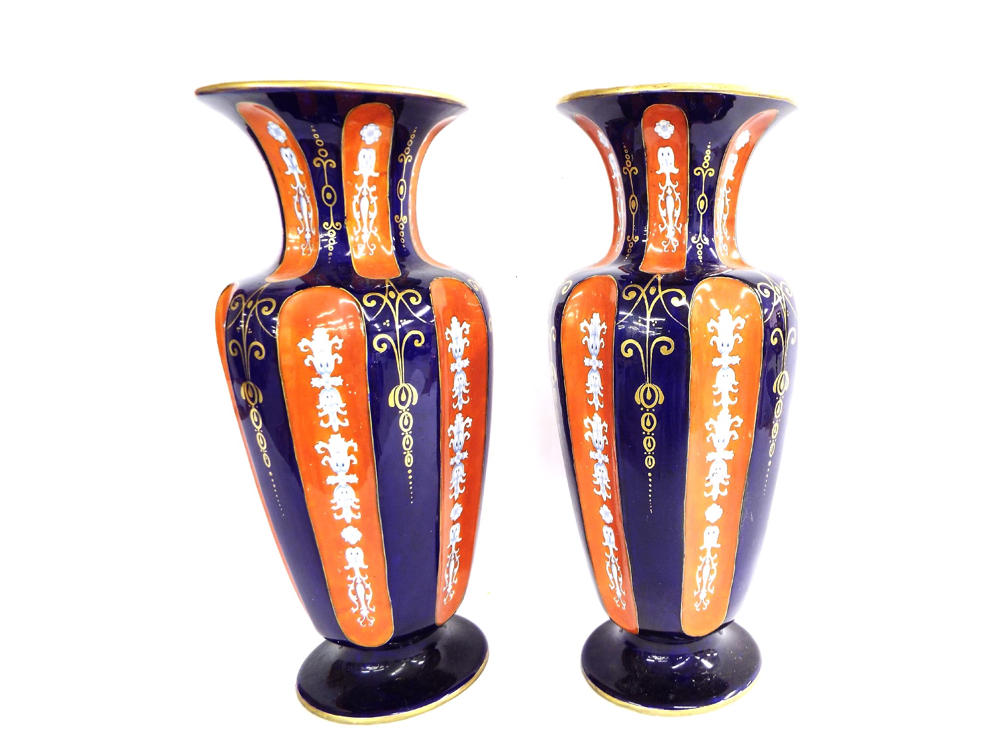 Appraisal: Pair of late th century faceted baluster vases decorated with