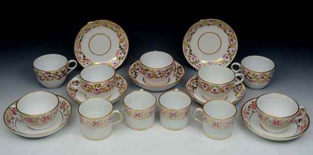 Appraisal: A SET OF FIVE PATTERN TEA CUPS and saucers each