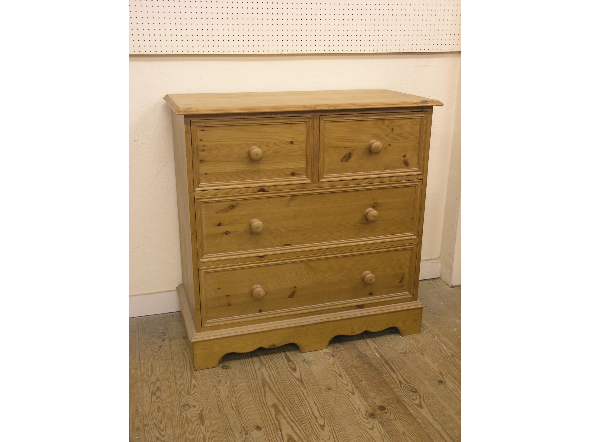 Appraisal: A waxed pine bedroom chest two short and two long