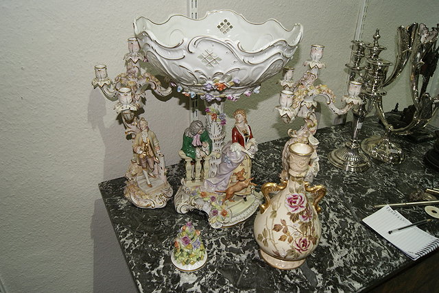 Appraisal: A CONTINENTAL PORCELAIN CENTREPIECE with figures to the column a