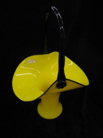 Appraisal: Czechoslovakia Art Glass Basket vivid yellow with black trim excellent