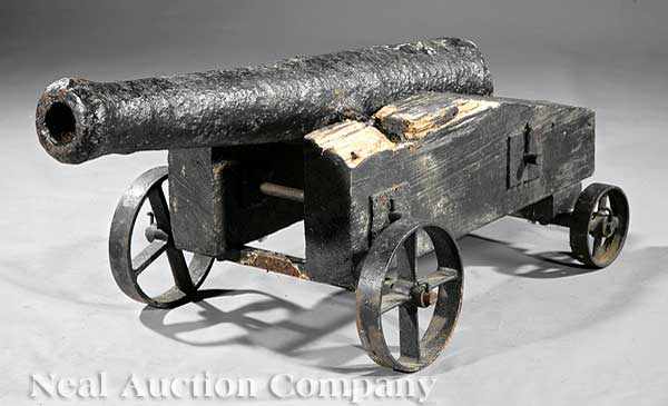 Appraisal: An Antique Ship's Cannon th c the carriage with iron