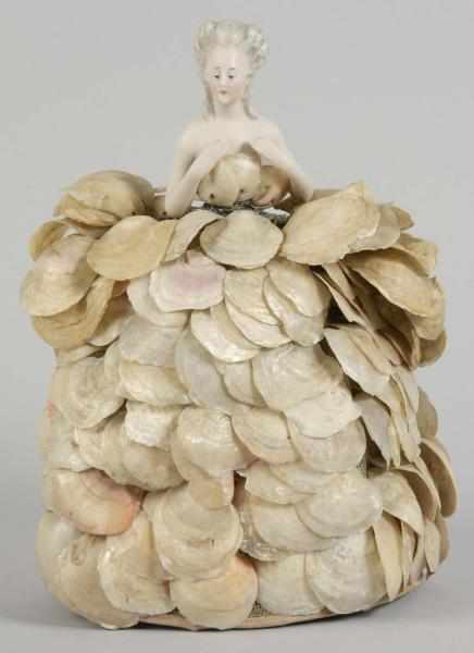 Appraisal: Porcelain Half Doll Lamp with Shell Skirt Description Bisque court