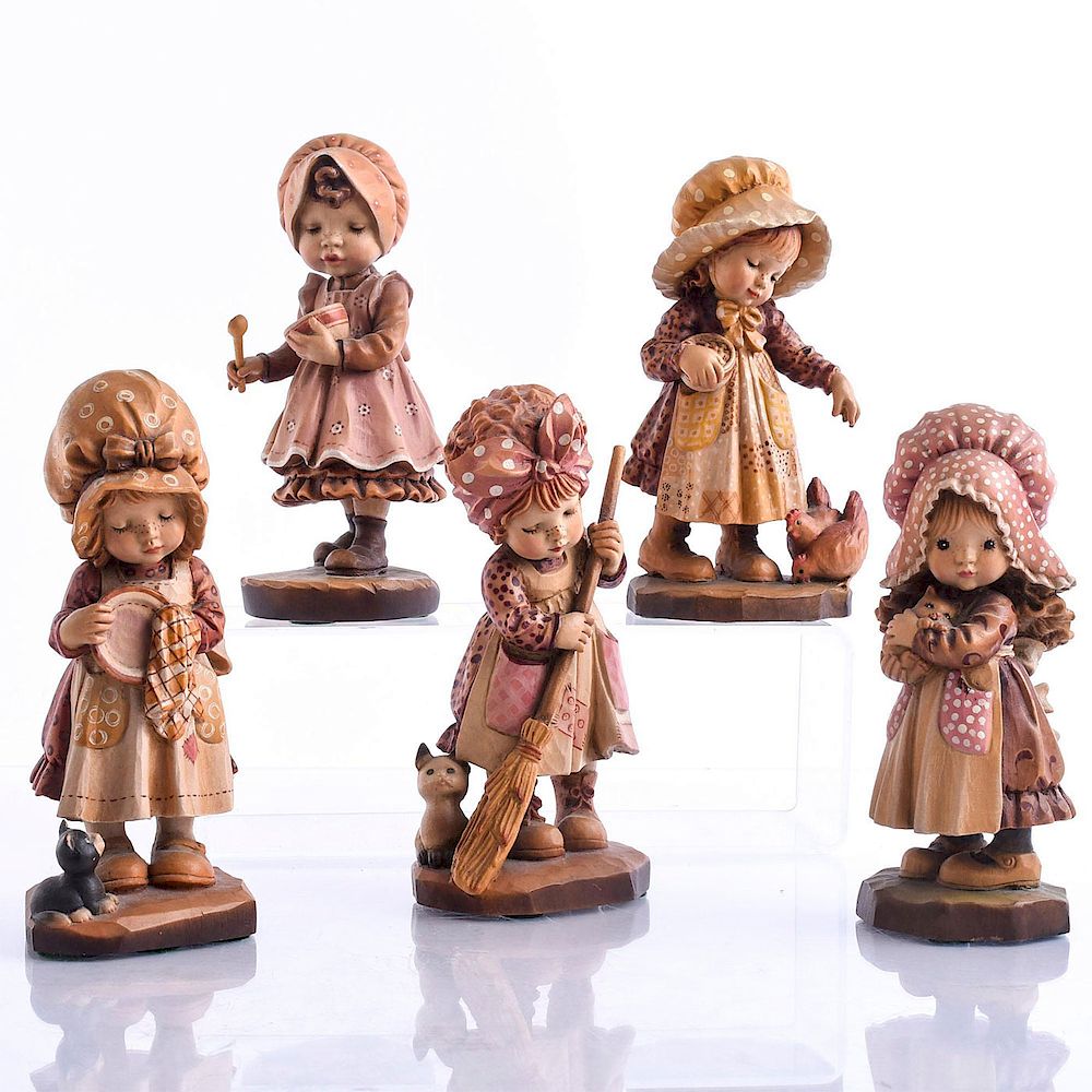 Appraisal: CARVED WOOD ANRI FIGURINES GIRLS Collection of young girls doing