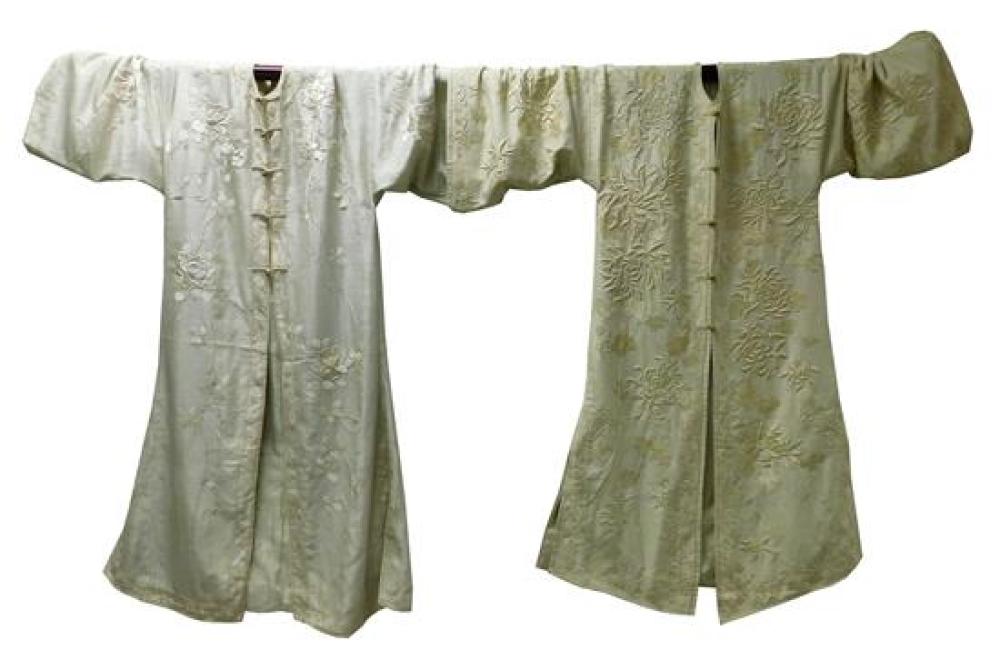 Appraisal: ASIAN Two Chinese coats th C both cream colored with