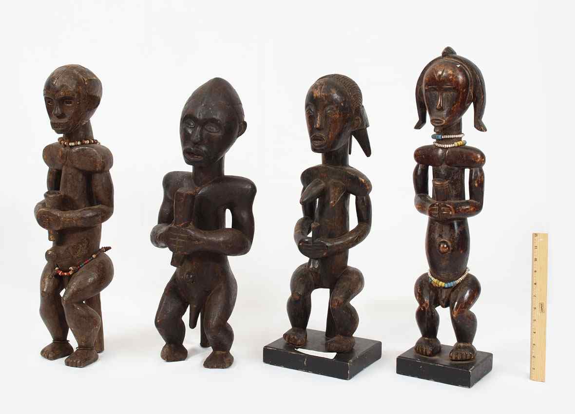 Appraisal: CARVED AFRICAN FANG FIGURINES '' x '' x '' lbs