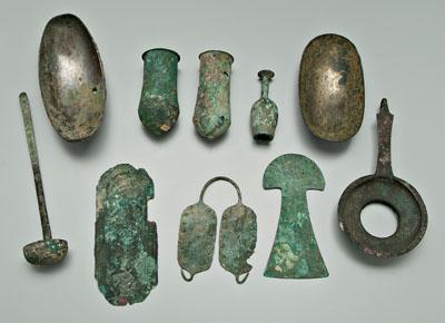 Appraisal: Ten ancient bronze objects ladle small vessel-shaped finial oval bowls