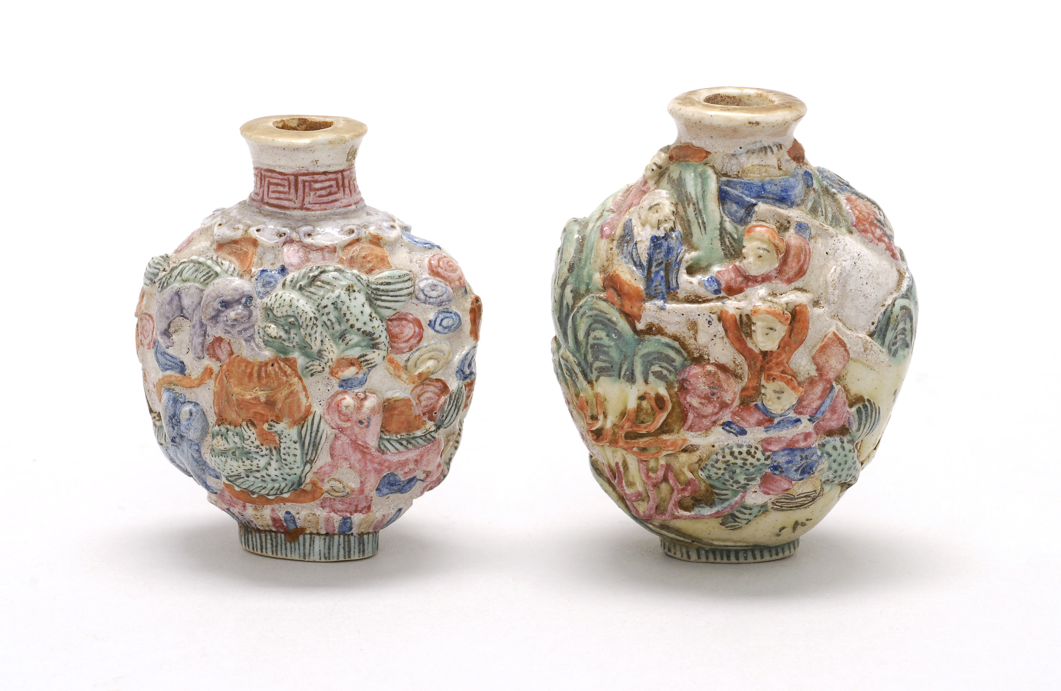 Appraisal: TWO MOLDED PORCELAIN SNUFF BOTTLES Late th CenturyBoth in ovoid