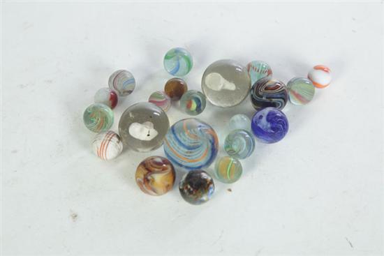 Appraisal: MARBLES American mid- th century Approximately ninety-nine marbles including two