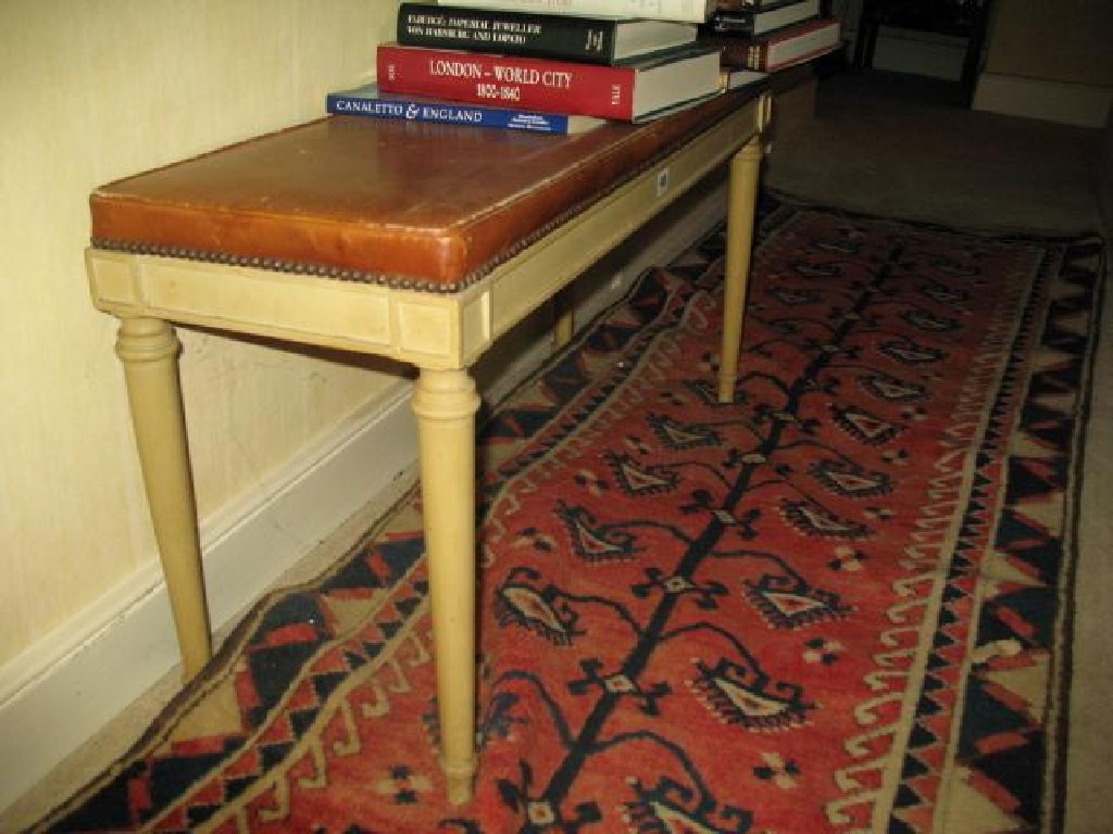 Appraisal: A LOUIS XVI STYLE STOOL with a rectangular leather seat