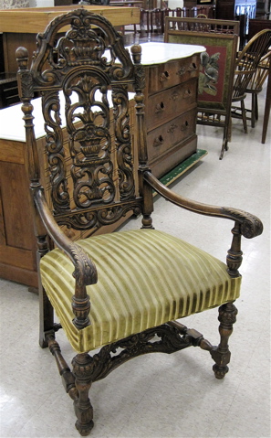 Appraisal: CHARLES II STYLE CARVED OAK ARMCHAIR American early th century