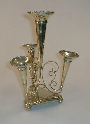 Appraisal: An Electroplate four trumpet epergne