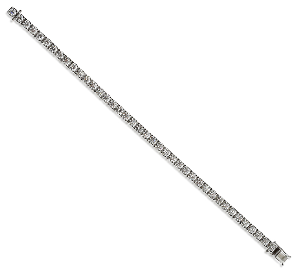 Appraisal: A DIAMOND LINE BRACELET Comprising forty round brilliant cut diamonds