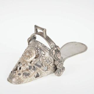 Appraisal: Spanish colonial silver lady's stirrup th c with bird and