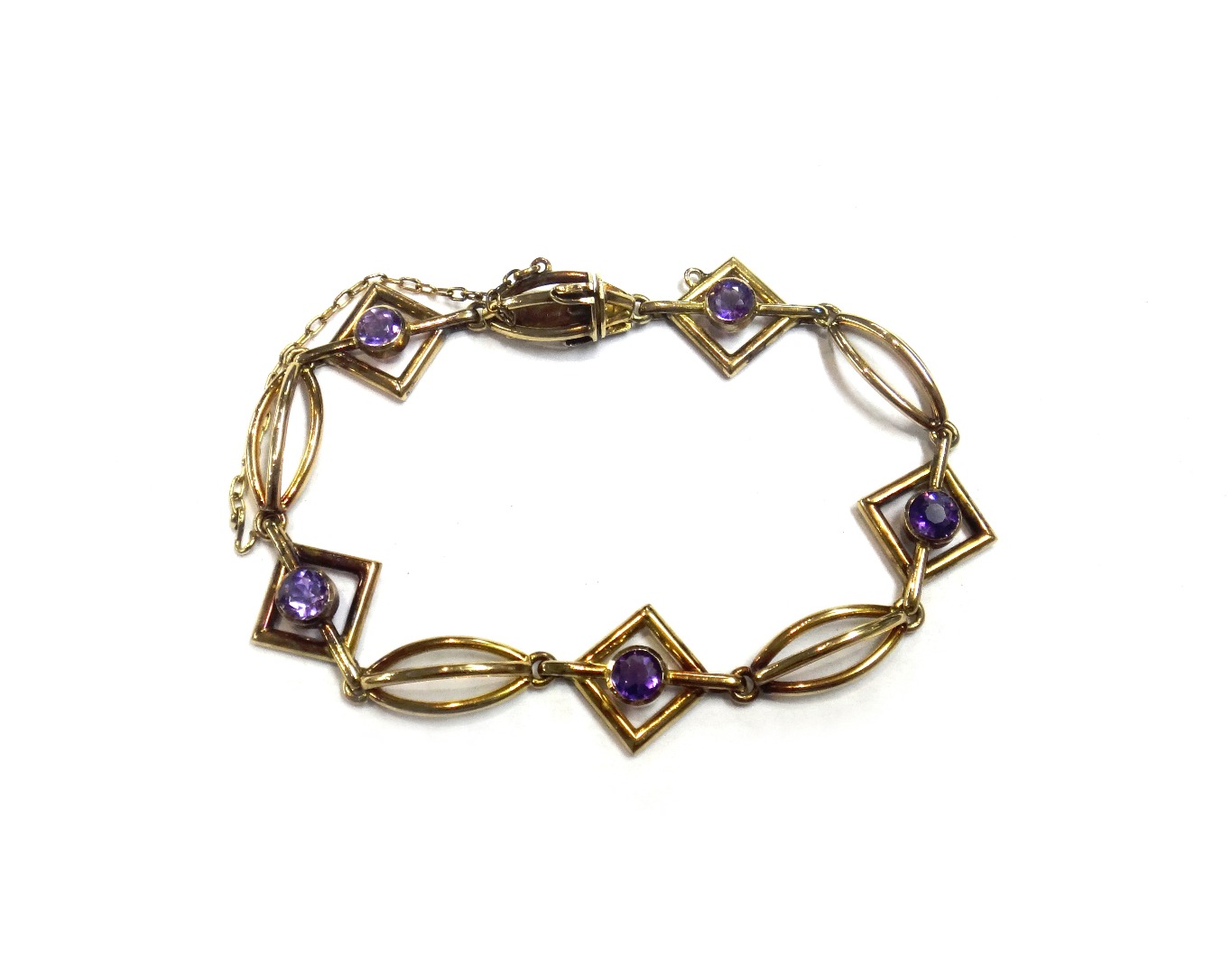 Appraisal: A gold and amethyst bracelet formed as a series of