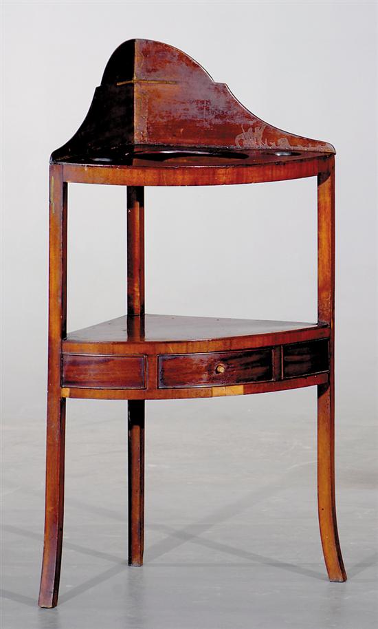 Appraisal: George III mahogany corner washstand circa shaped backsplash behind upper