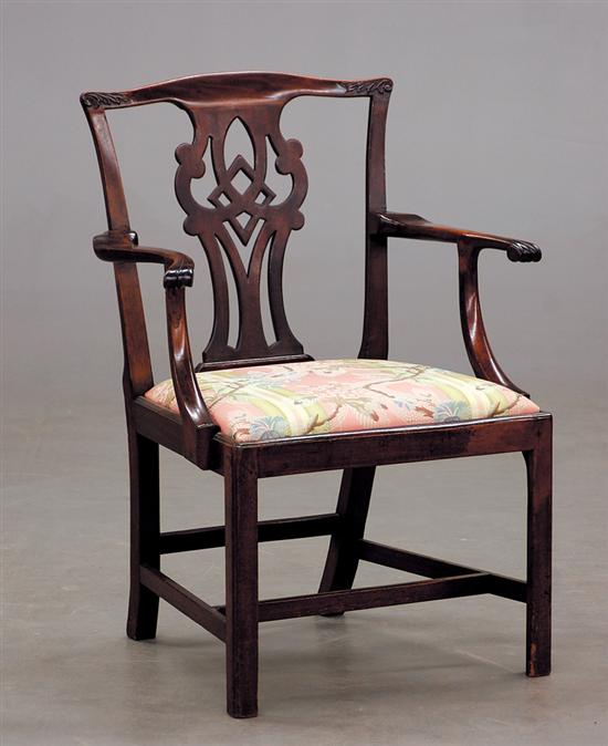 Appraisal: George III carved mahogany armchair early th century shaped crest