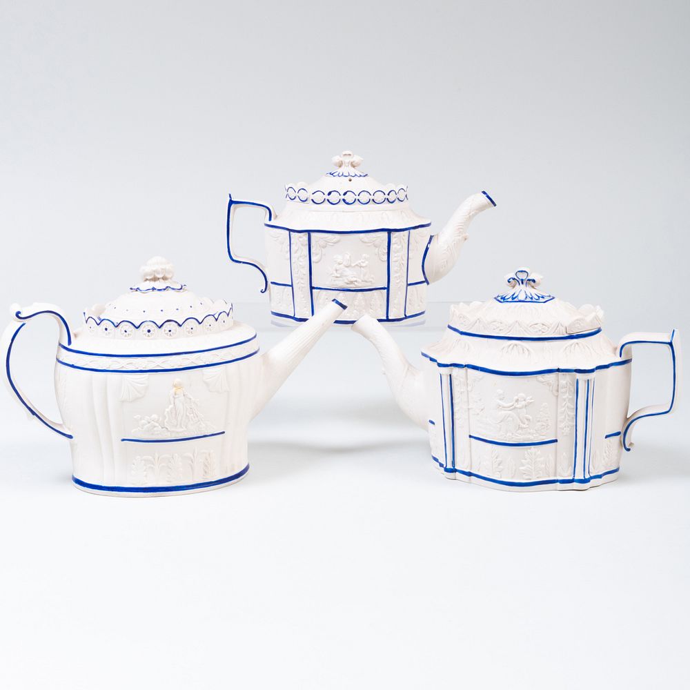 Appraisal: Group of Three Castleford Type Pottery Teapots Comprising A teapot